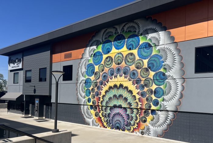 A large, eye-catching mural representing local culture and creativity in Cincinnati, OH