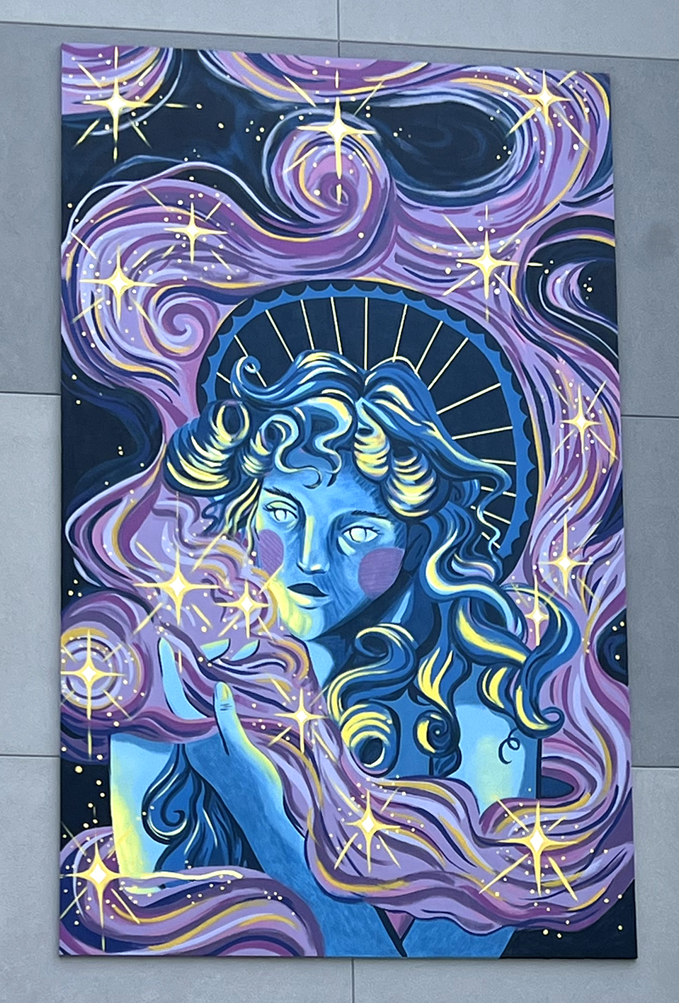 A woman’s face painted with stars, capturing a whimsical essence in Cincinnati, OH